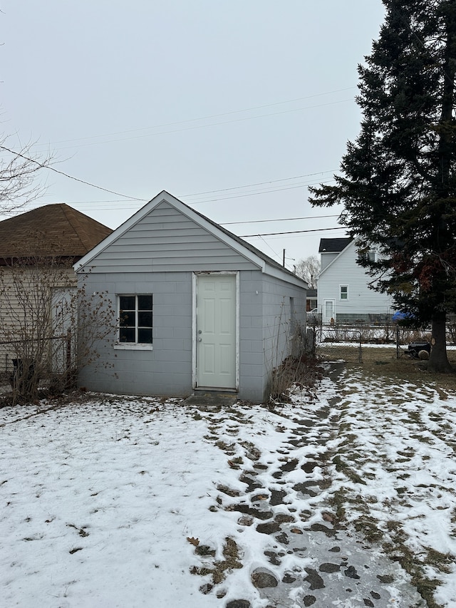 view of snow covered house