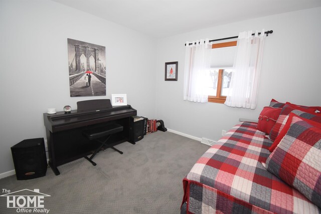 sitting room featuring carpet flooring