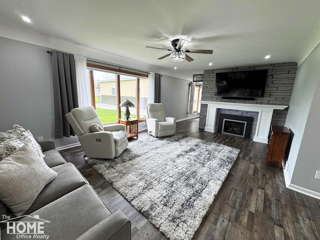 200 Elmwood Dr, Corunna, MI 48817 - living room featuring a fireplace, a ceiling fan, baseboards, recessed lighting, and dark wood-style floors