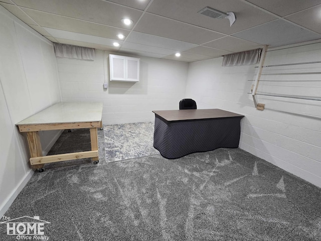 200 Elmwood Dr, Corunna, MI 48817 - carpeted office space with concrete block wall, visible vents, and a paneled ceiling