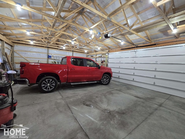 200 Elmwood Dr, Corunna, MI 48817 - garage with a garage door opener