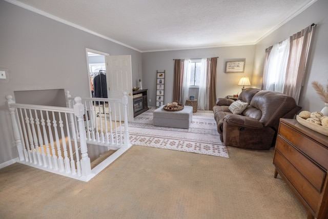 living room featuring ornamental molding, light colored carpet, a textured ceiling, and a fireplace