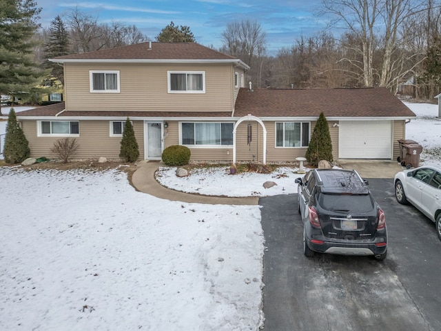 view of front of home with a garage