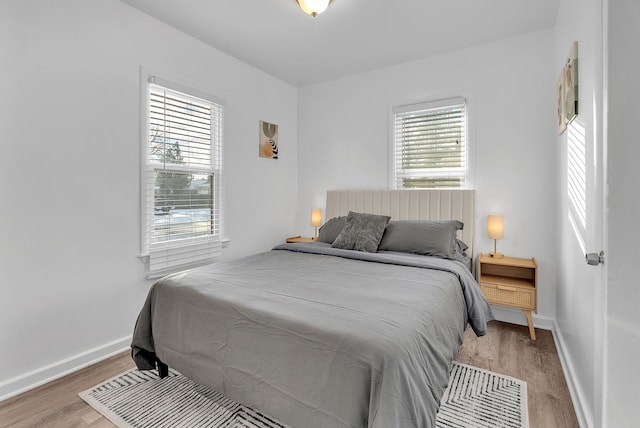 bedroom featuring wood-type flooring