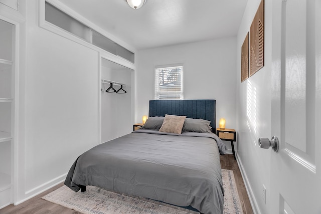 bedroom with wood-type flooring