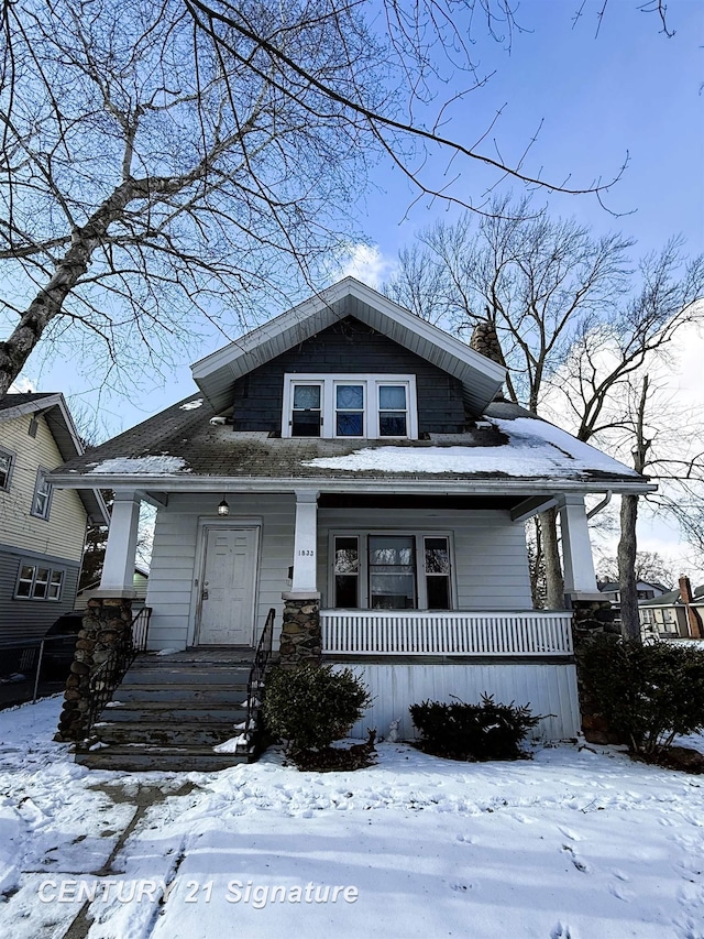 bungalow-style home featuring covered porch