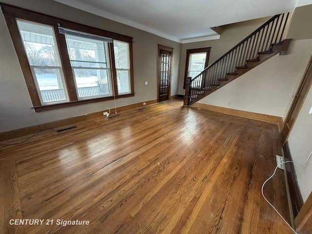 entrance foyer featuring hardwood / wood-style floors