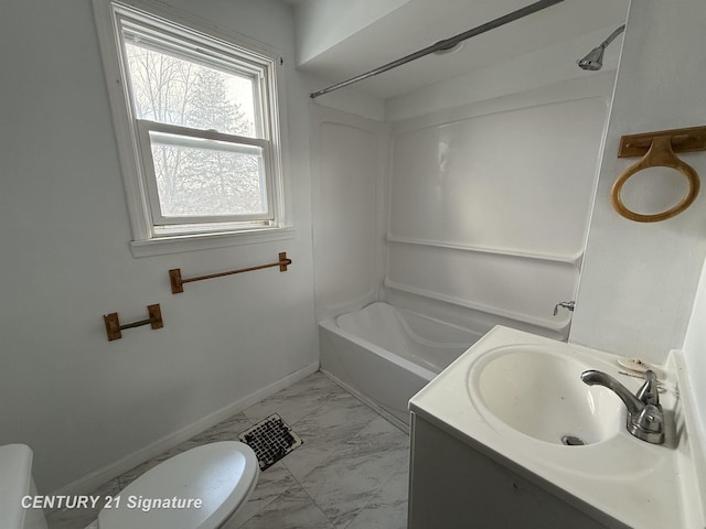 full bathroom featuring toilet, vanity, and bathtub / shower combination