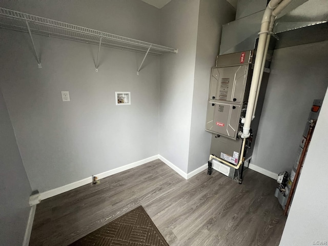 washroom with hookup for a washing machine and hardwood / wood-style floors