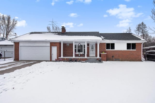 ranch-style house featuring a garage