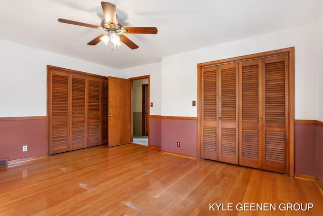 unfurnished bedroom with light hardwood / wood-style floors and ceiling fan