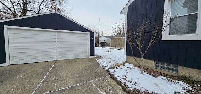 view of snow covered garage