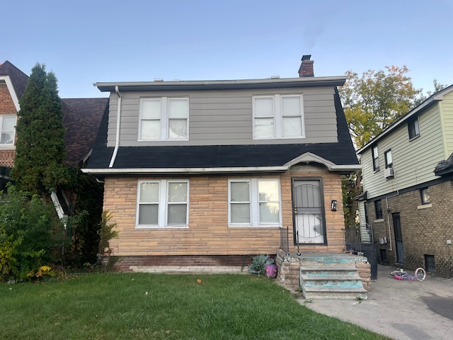 view of front of house featuring a front yard