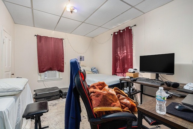 bedroom with a drop ceiling