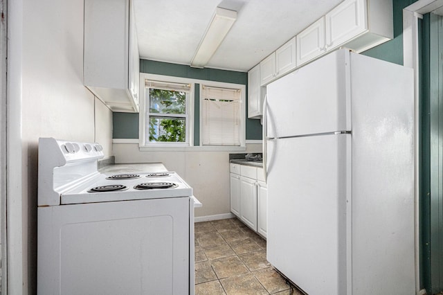 kitchen with white cabinets and white appliances