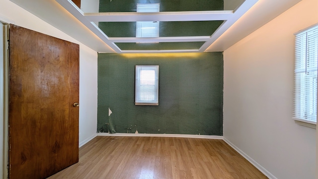 spare room with light wood-type flooring