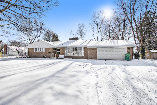 single story home featuring a garage