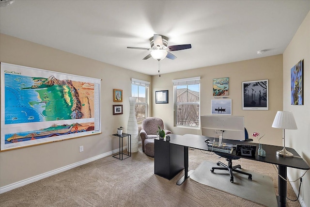 office area featuring ceiling fan and carpet