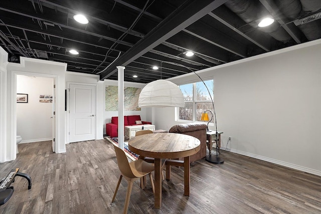 dining space featuring wood-type flooring