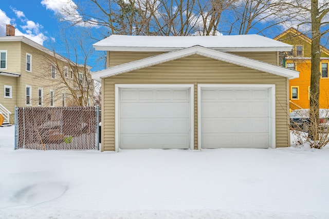 view of snow covered garage