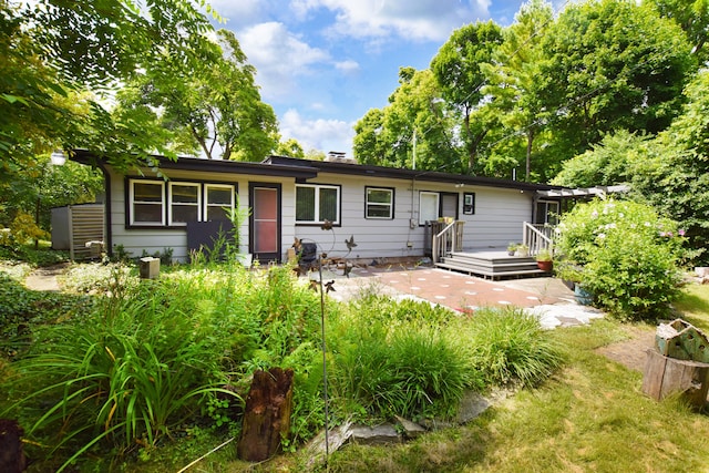 ranch-style home with a patio area, a pergola, and a deck