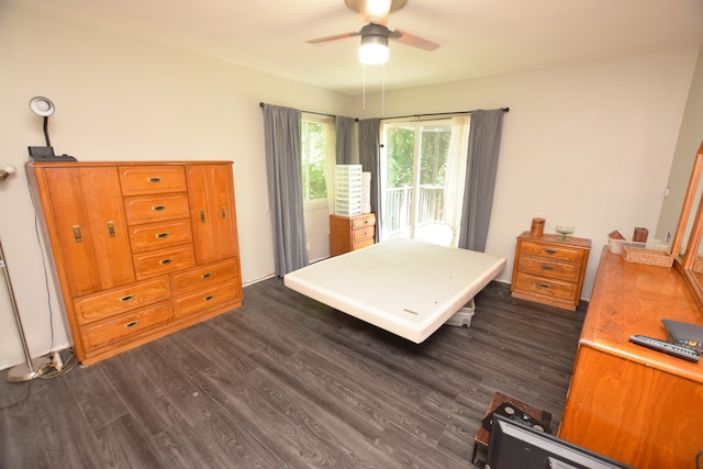 bedroom featuring dark hardwood / wood-style floors and ceiling fan