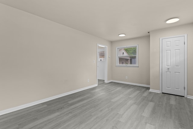 empty room with light wood-type flooring