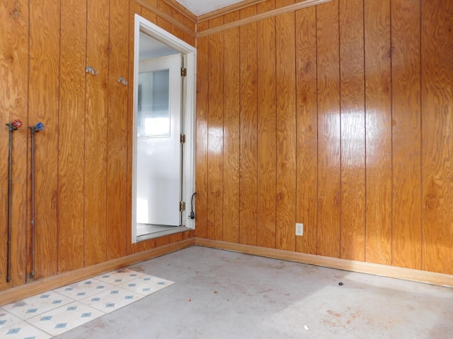 empty room with wooden walls