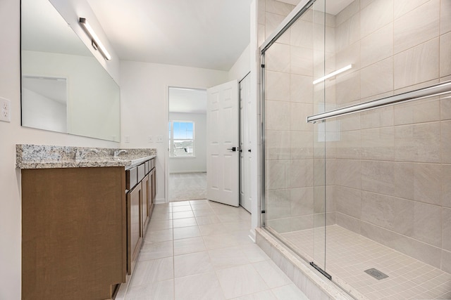 11964 Timber Ct, Bruce, MI 48065 - full bath with vanity, tile patterned floors, baseboards, and a stall shower