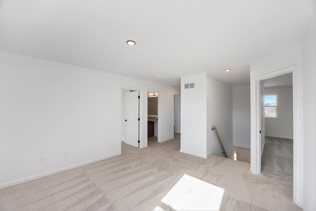 11964 Timber Ct, Bruce, MI 48065 - unfurnished room featuring baseboards, light colored carpet, and visible vents