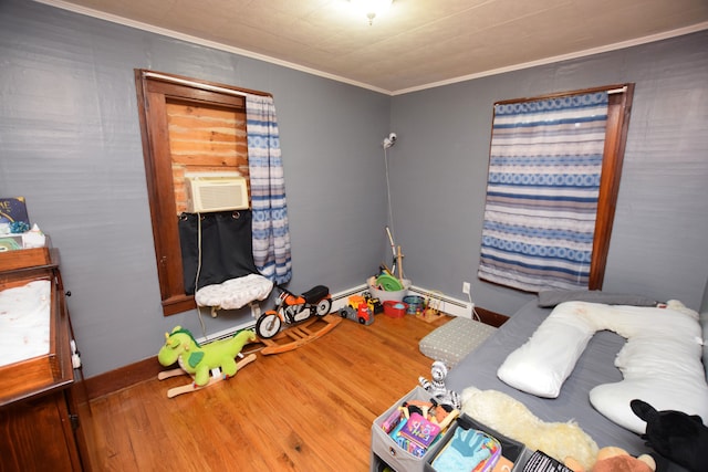 bedroom with wood-type flooring, cooling unit, and ornamental molding