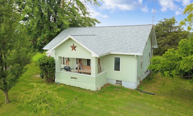 view of front of home with a front yard