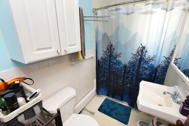 bathroom featuring sink, tile walls, toilet, and a shower with shower curtain