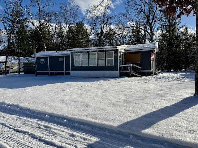 view of snow covered property