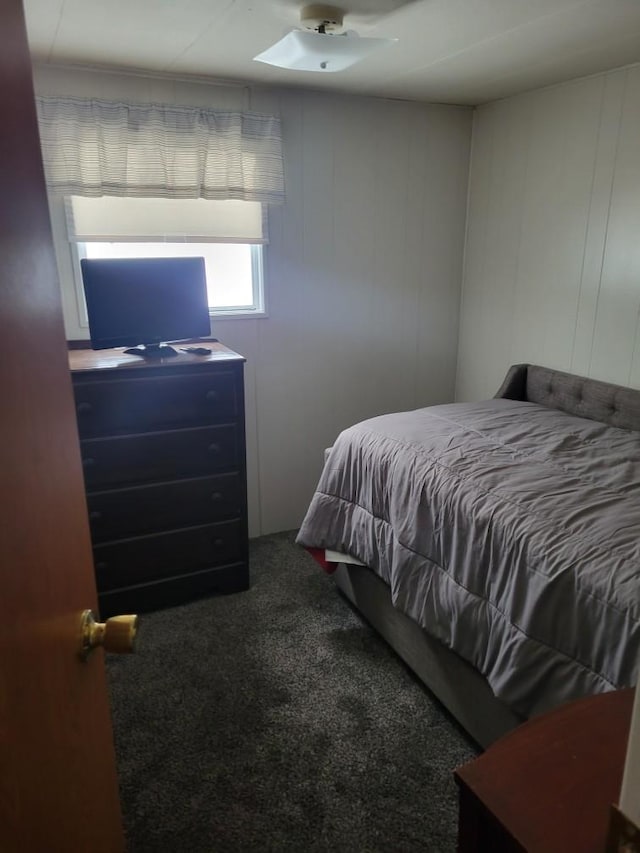 bedroom featuring ceiling fan and carpet floors