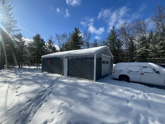 view of snow covered garage