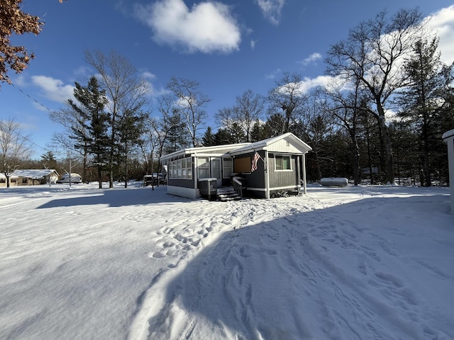 exterior space with a sunroom