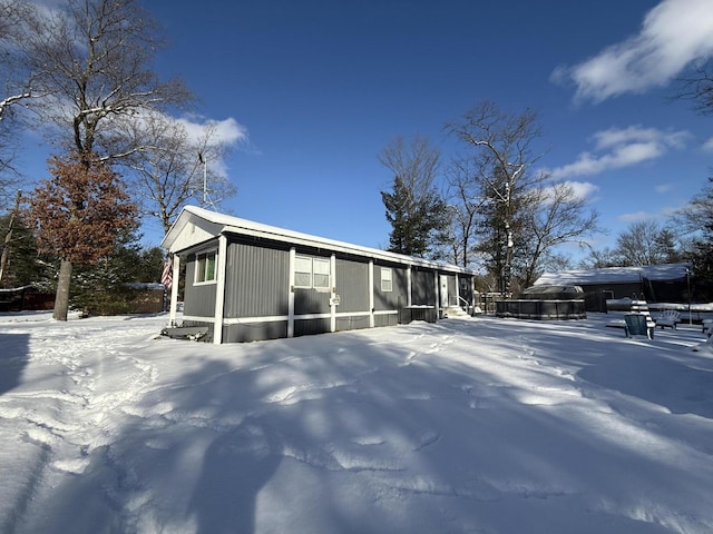 view of snow covered property