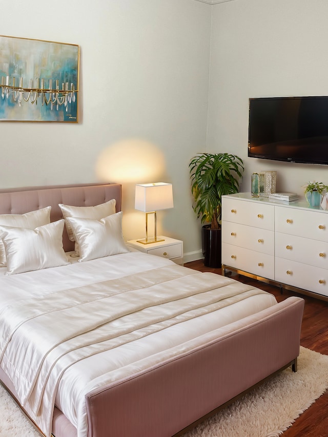 bedroom with dark wood-type flooring