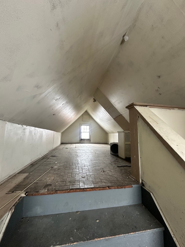 bonus room with lofted ceiling