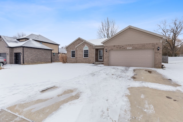 single story home with a garage