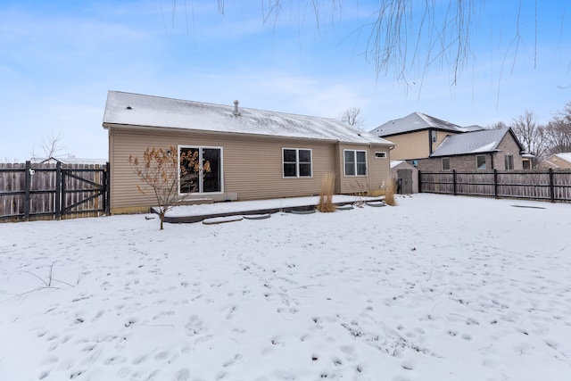 view of snow covered house