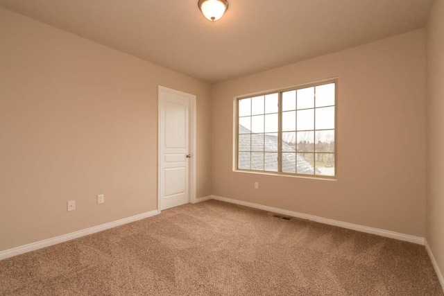 view of carpeted spare room