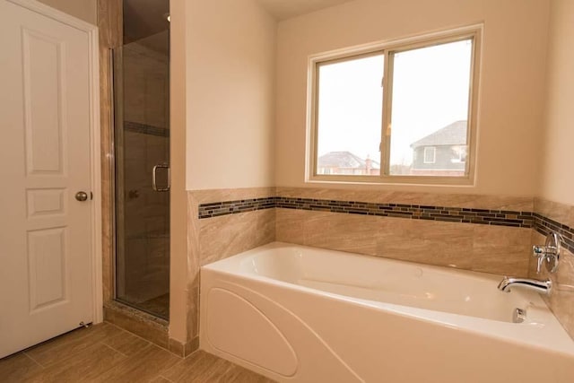 bathroom with independent shower and bath