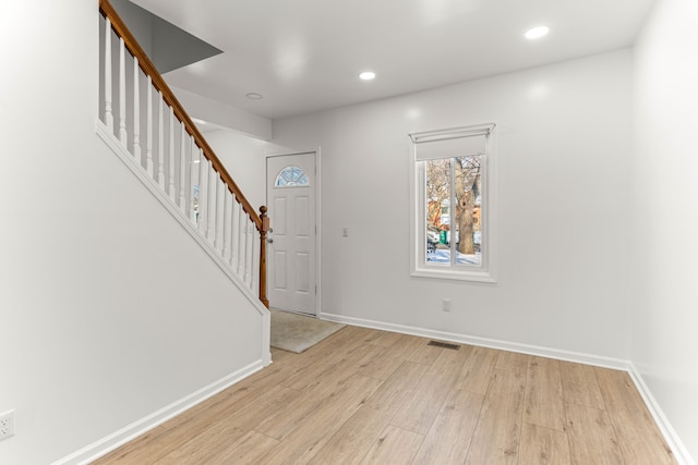 foyer with light hardwood / wood-style flooring