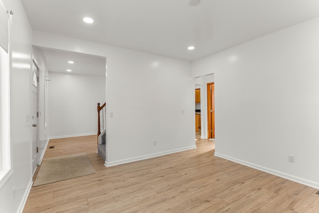 empty room with light wood-type flooring