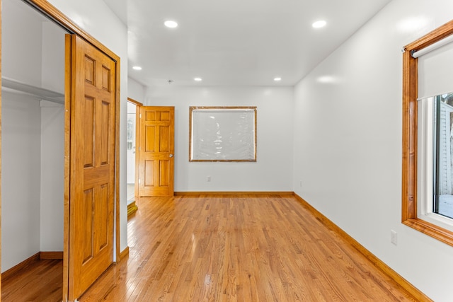 hall featuring light hardwood / wood-style flooring