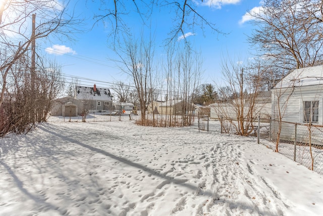 view of yard covered in snow