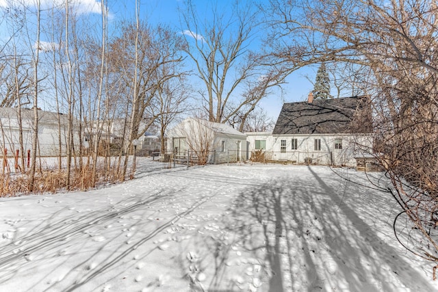 view of yard covered in snow