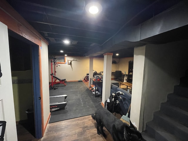 workout area featuring hardwood / wood-style floors